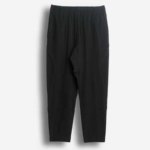 A model wears O.N.S clothing x ABASI ROSBOROUGH